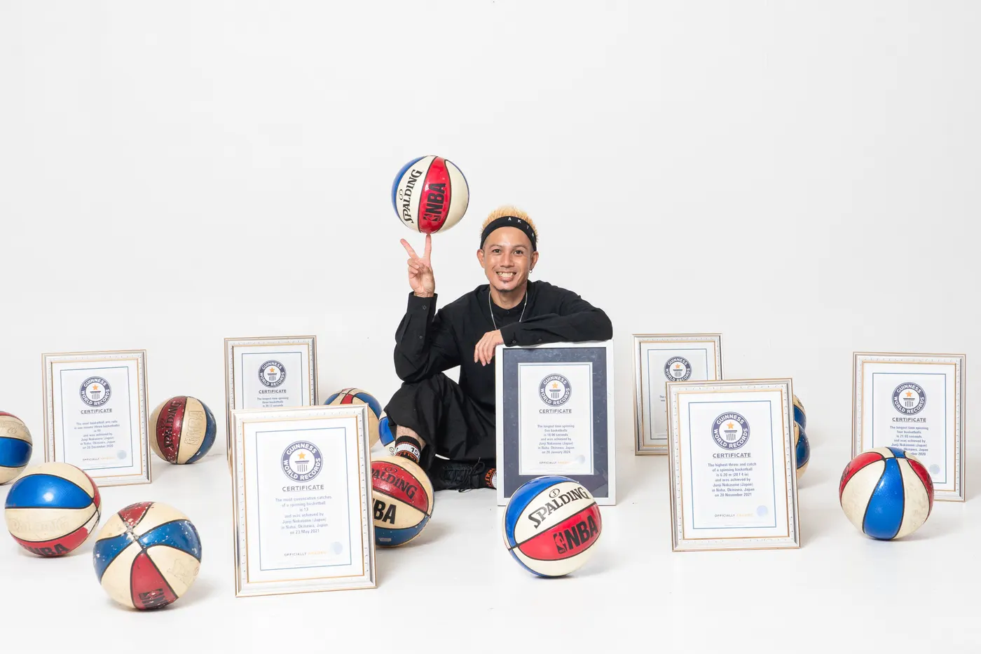 PERFORMER JJ with his GUINNESS WORLD RECORDS certificates